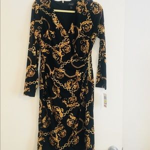 Thalia Sodi Black and gold chain print dress.